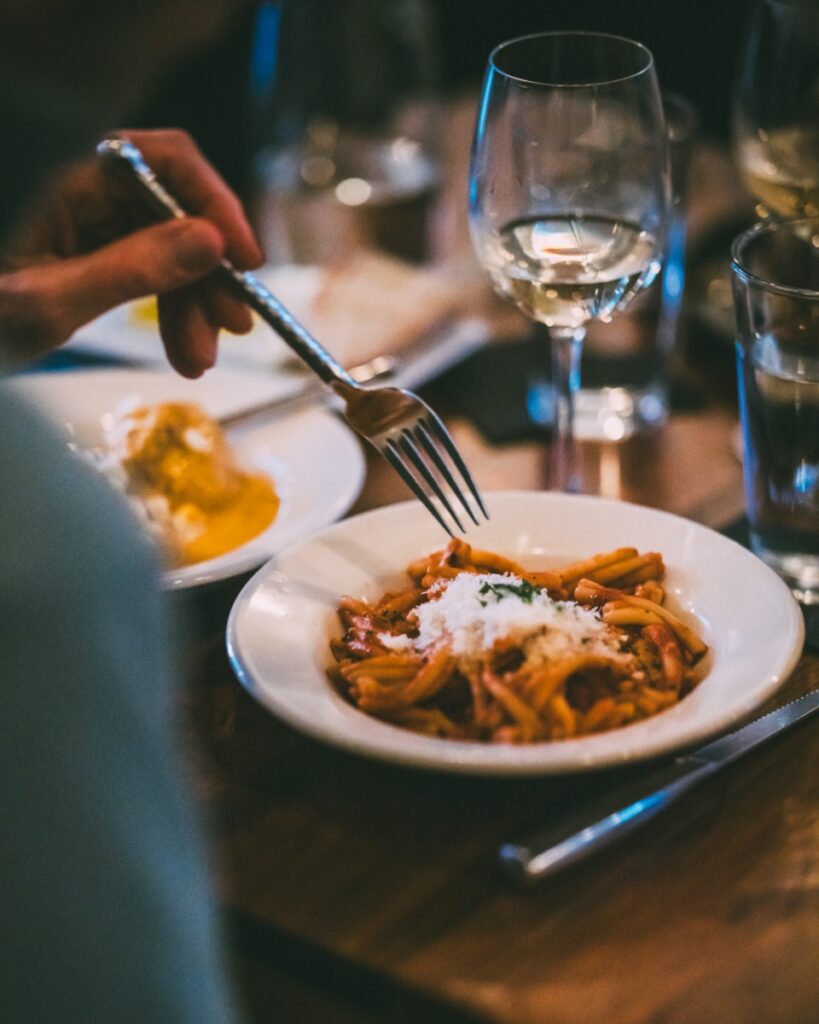 Close-up of a house-made pasta dish with shaved parmesan cheese at Vivo Kitchen.